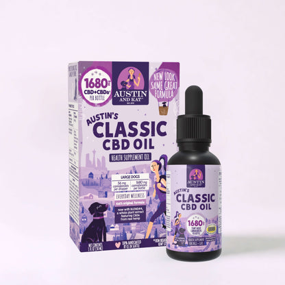 Extra Strength CBD oils by Austin and Kat in dark glass bottles with dropper caps, displayed on a neutral background.