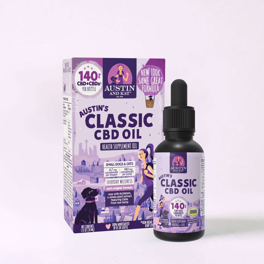 Austin and Kat CBD oil for dogs in a glass dropper bottle, showing the product label and liquid inside.
