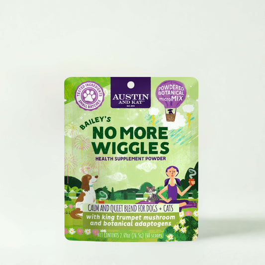 Austin and Kat No More Wiggles Powder supplement topper for pets, shown as a jar of powder with scoops and pet treats.